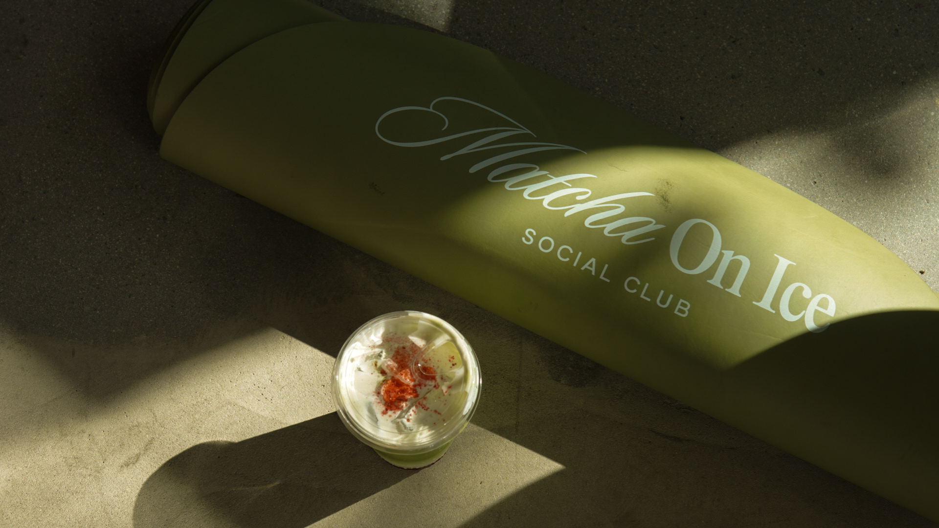 Matcha On Ice branded mat and drink